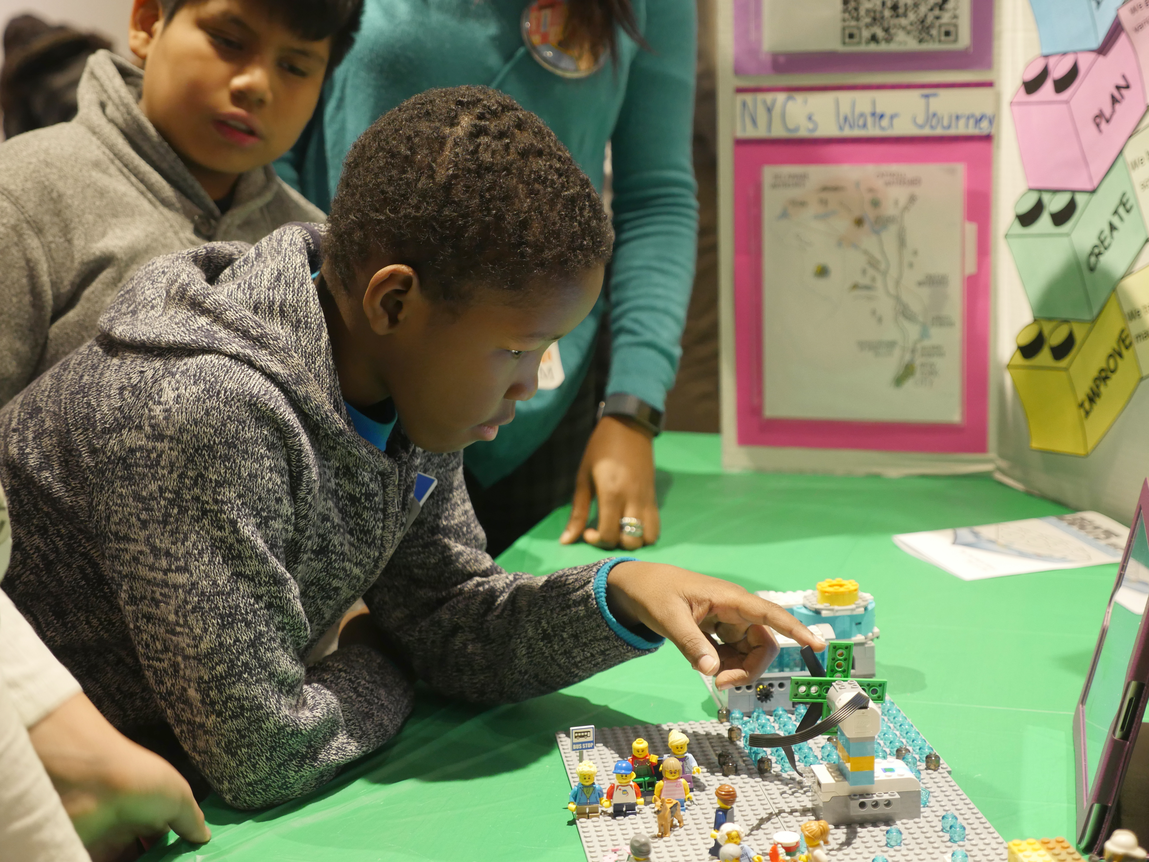 Students developing communication and collaboration skills using LEGO Education WeDo 2.0 sets